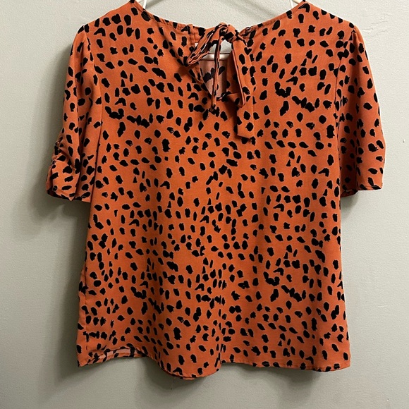 Orange printed shortsleeved blouse with back tie - Picture 2 of 3